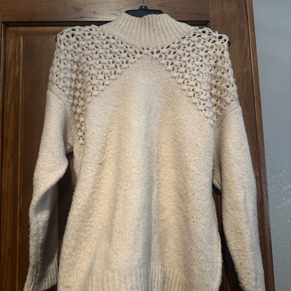 Size Medium Cream 100% Acrylic super soft mock neck sweater by SHE + SKY. $16.00